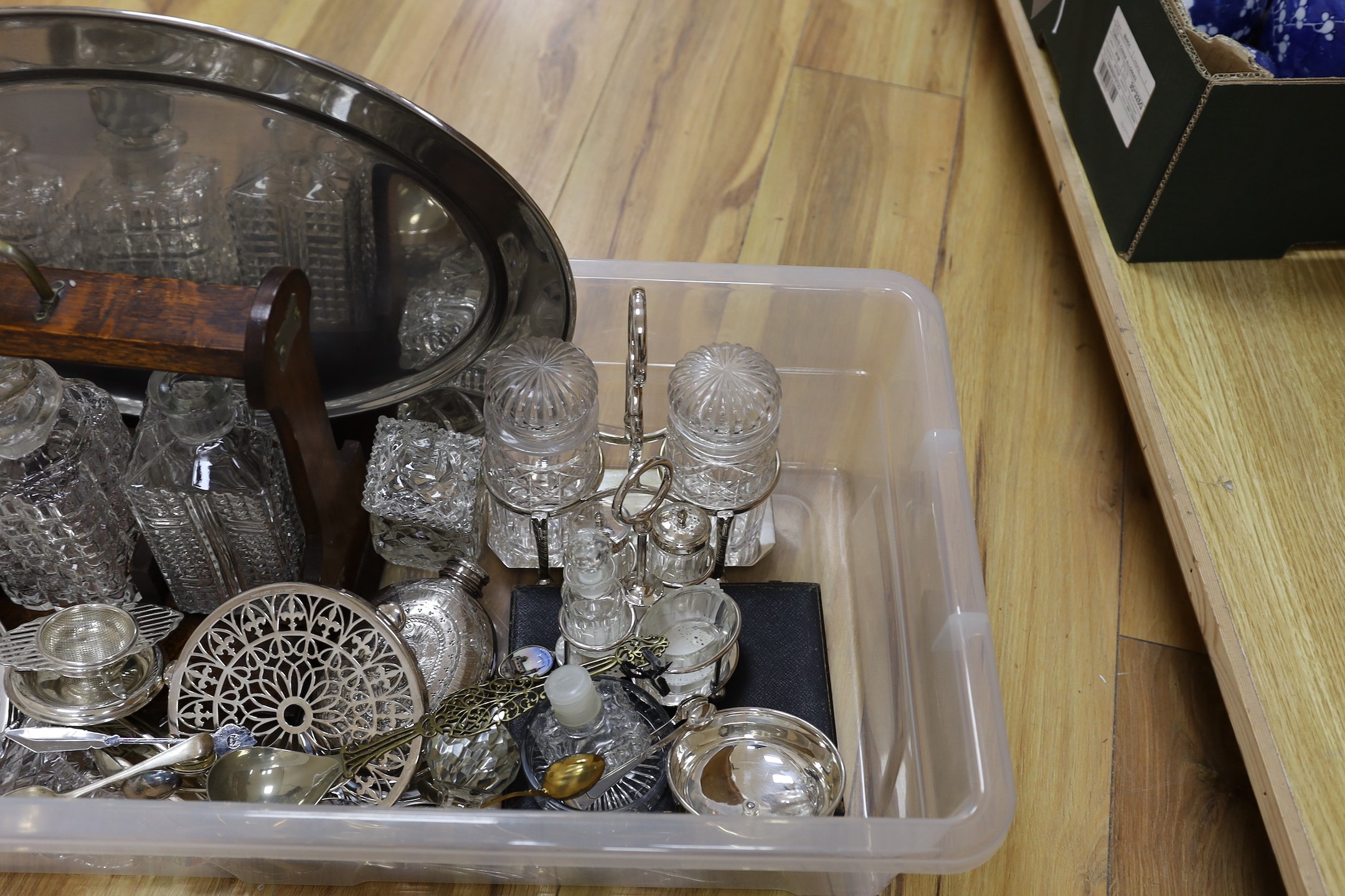 Assorted plated ware including tantalus, cruet set, hip flask, flatware etc